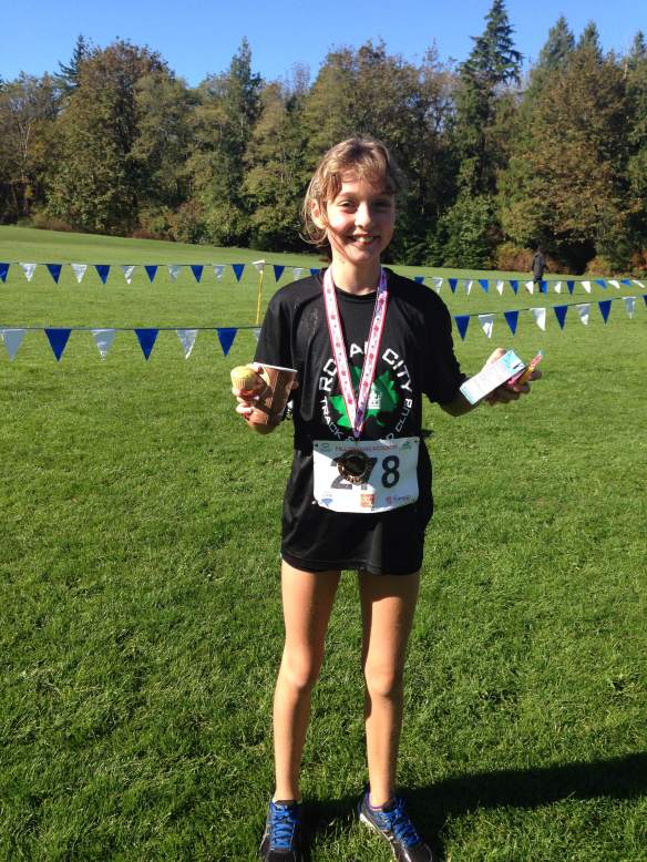 Emily Bowles takes Bronze Medal in 11 year old girls' category at Festival of Cross Country 3.0km race